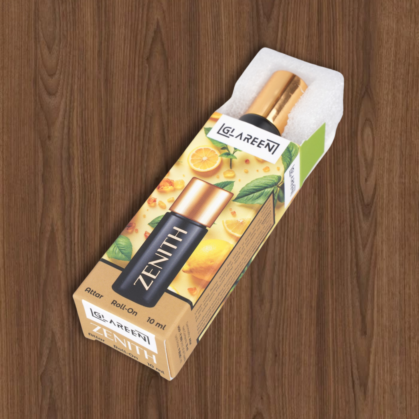 Zenith Attar by GLAREEN is a handcrafted unisex luxury roll-on perfume in a 10 ml black bottle with a gold cap, boxed and decorated with lemon, citrus fruits, and herbs on a wooden surface.