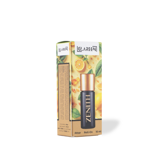 A small box labeled Zenith Attar Unisex Luxury Roll-On 10 ml, with a black and gold bottle image. The packaging, decorated with citrus fruits and green leaves, emphasizes its handcrafted quality and fresh lemon fragrance.